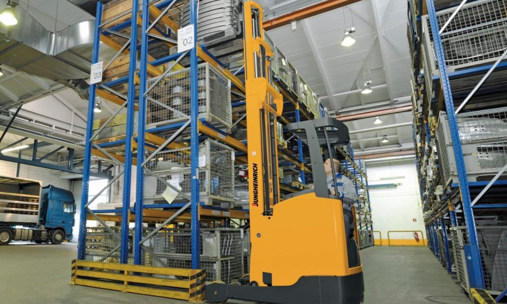 Jungheinrich Reach Truck in warehouse aisle