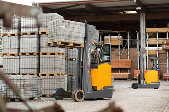 Reach Trucks working outside